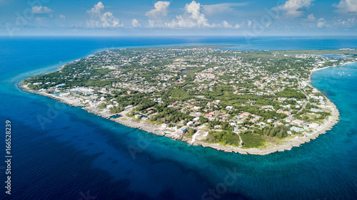 Aerial view of Grand Cayman and its surrounding coral reef photo