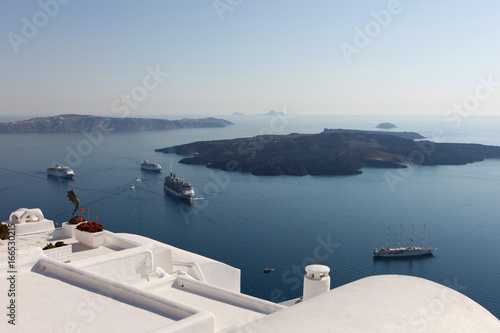 Cruise liners near the island of Santorini. View of the caldera
