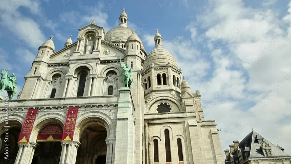 Hyperlapse panorama of the Sacred Heart of Paris church in France. Basilique du Sacre-Coeur de Montmartre, Historic district of Paris city in a blue cloudy sky. Hyperlapse panorama of the Sacred Heart of Paris church in France. Basilique du Sacre-Coeur de Montmartre, Historic district of Paris city in a blue cloudy sky.