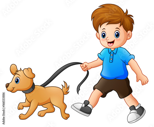 Little boy walking with his dog