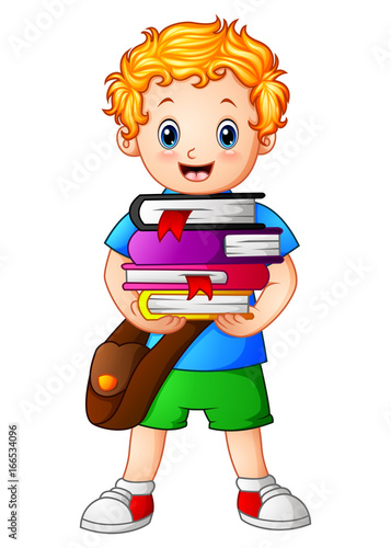 School boy holding stack of books