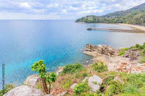 Aerial view of the beaches and rocky cape in Phuket  Andaman Sea  landscape in cloudy weather  rocks and bushes on the shore