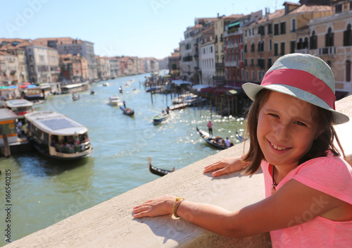 Pretty little girl above the Rialto bridge in Venice in Italy an © ChiccoDodiFC