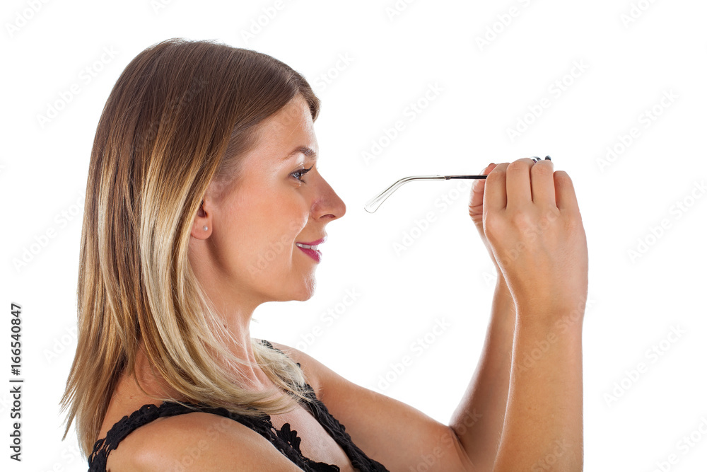 Attractive woman holding her sunglasses - isolated Attractive woman holding her sunglasses - isolated