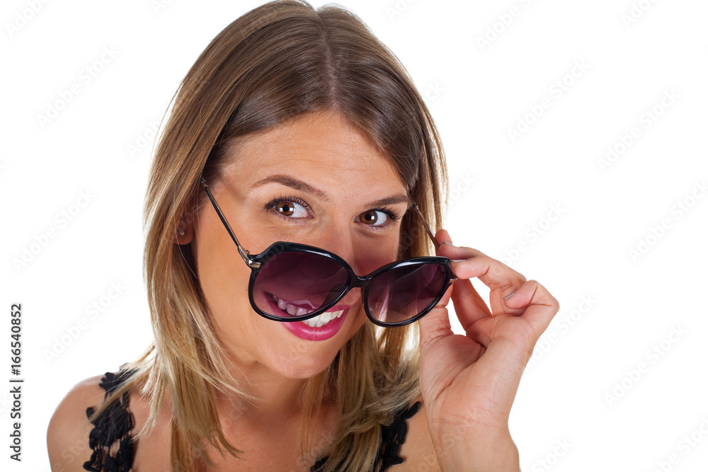 Attractive woman holding her sunglasses - isolated Attractive woman holding her sunglasses - isolated