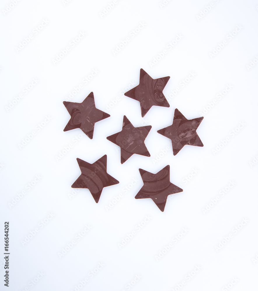 Obraz premium Chocolate or chocolate star on a background.