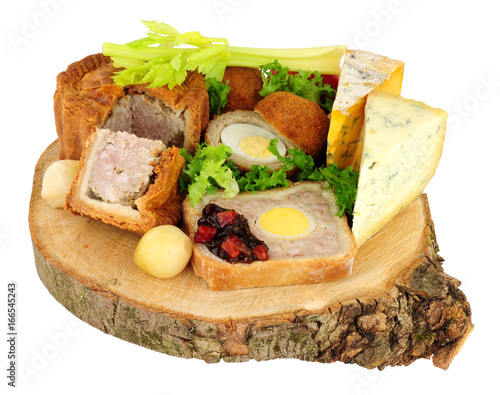 Traditional ploughman's buffet lunch ingredients isolated on a white background
