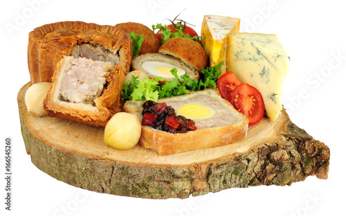 Traditional ploughman's buffet lunch ingredients isolated on a white background