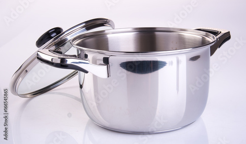 pot or stainless steel cooking pot on a background.