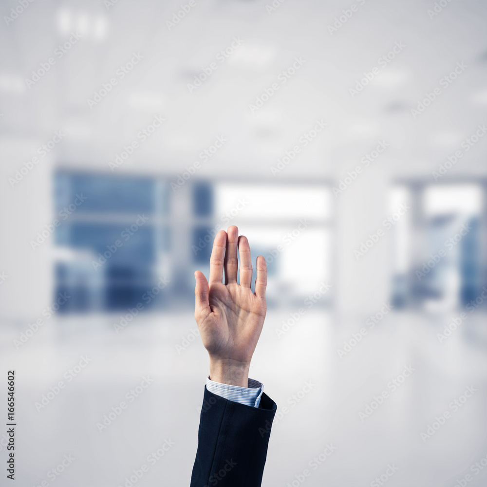 Choosing gesture of businessperson in elegant modern interior in Choosing gesture of businessperson in elegant modern interior in