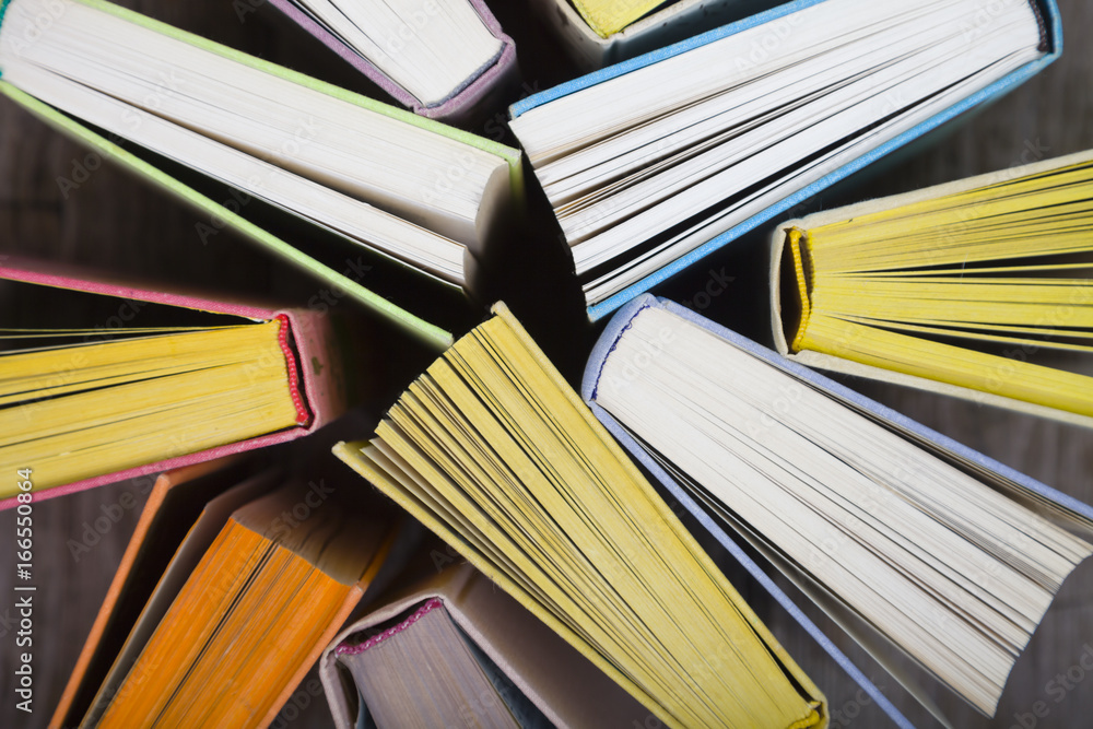 Fototapeta premium Multicolored books, top view