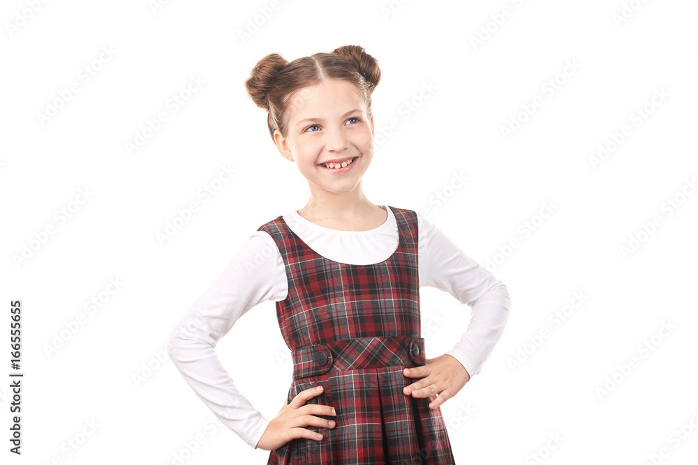 Portrait of cute girl in school uniform smiling against white background Portrait of cute girl in school uniform smiling against white background