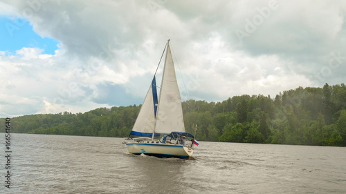 sailing yacht on the river