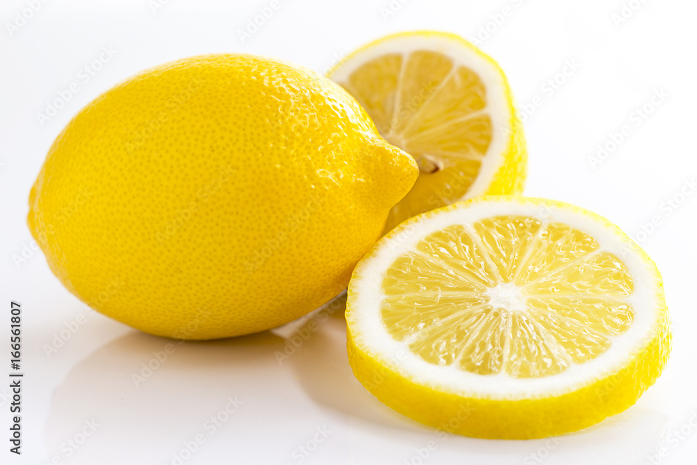 whole lemon and Lemon slice isolated on white background.
