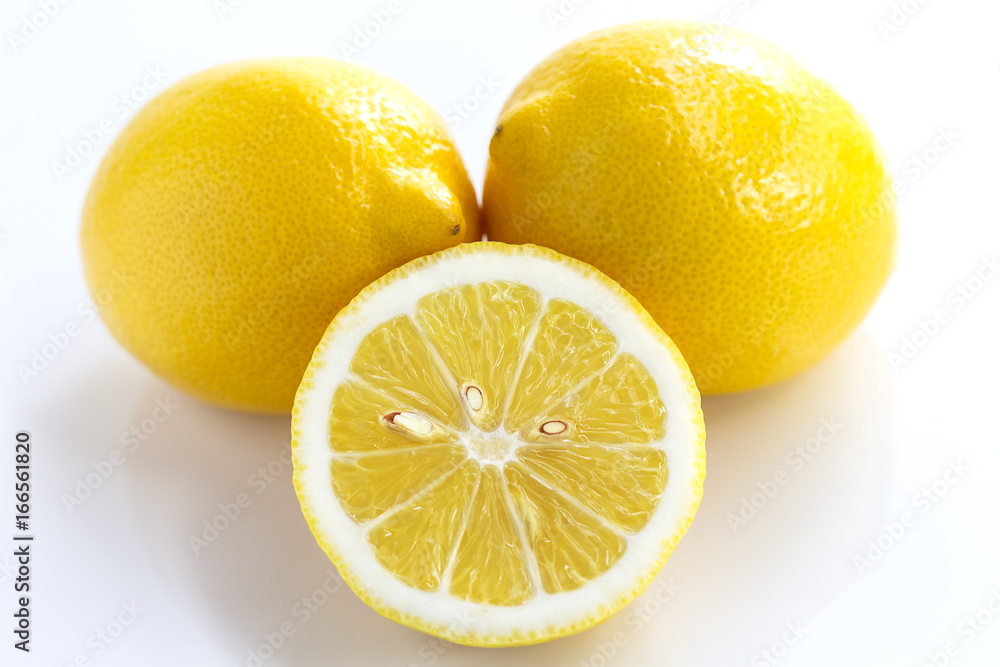 whole lemon and Lemon slice isolated on white background.