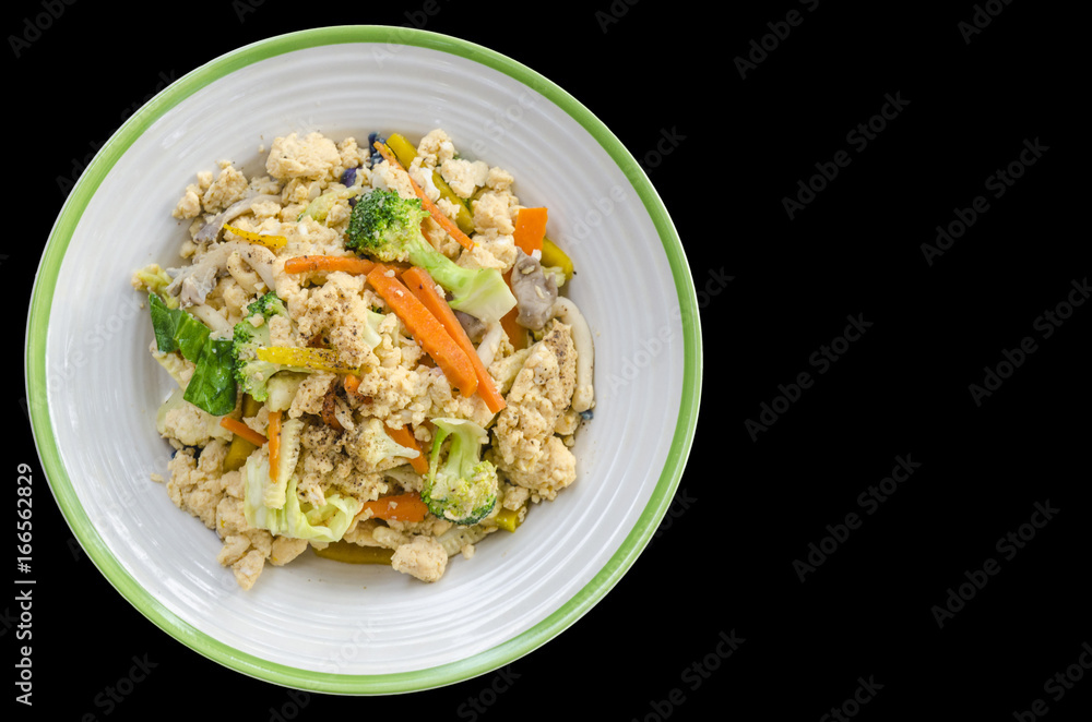 Thai food stir fry vegetables isolated on black background. Thai food stir fry vegetables isolated on black background.