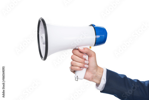 cropped view of businesswoman holding megaphone, isolated on white