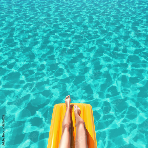 Well-groomed feet in the pool