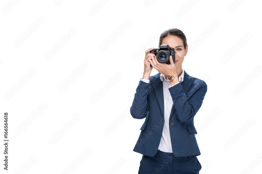 beautiful female photographer taking photo on professional camera, isolated on white beautiful female photographer taking photo on professional camera, isolated on white