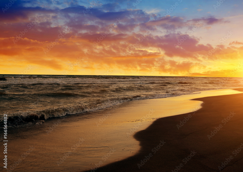 Colorful sunset sky above the sea. Nature background.