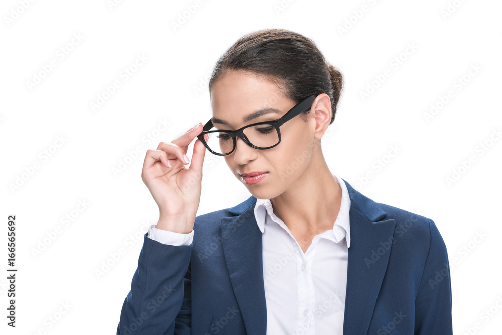 portrait of attractive pensive businesswoman in eyeglasses, isolated on white