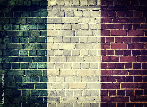 Grunge Italy flag on a brick wall