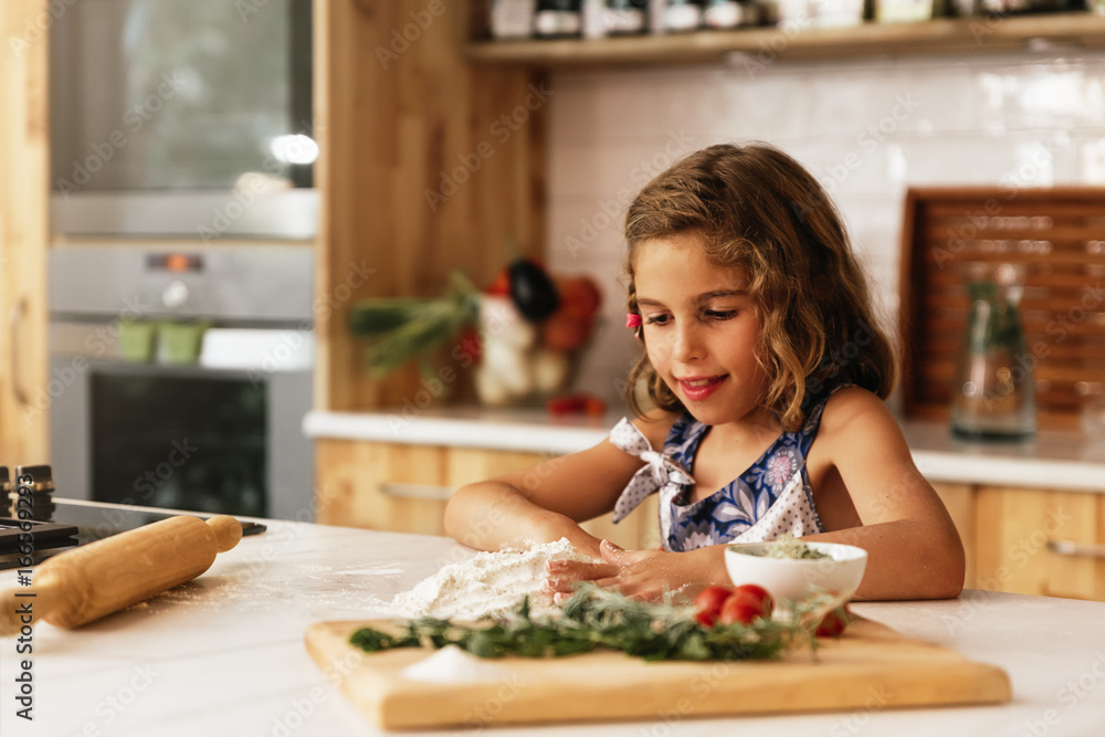 Portrait of little girl preparing baking cookies. Portrait of little girl preparing baking cookies.