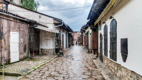 Wallpaper Mural SARAJEVO, BOSNIA AND HERZEGOVINA - May 1 2014: Street with shops selling souvenirs at Bascarsija in the old city district Torontodigital.ca