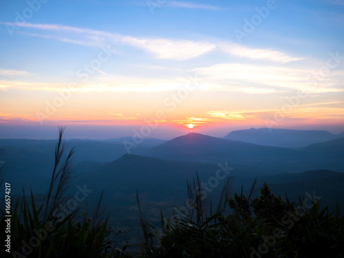 sunset and layer of mountain