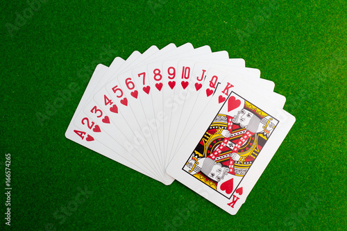 set of play card on green table