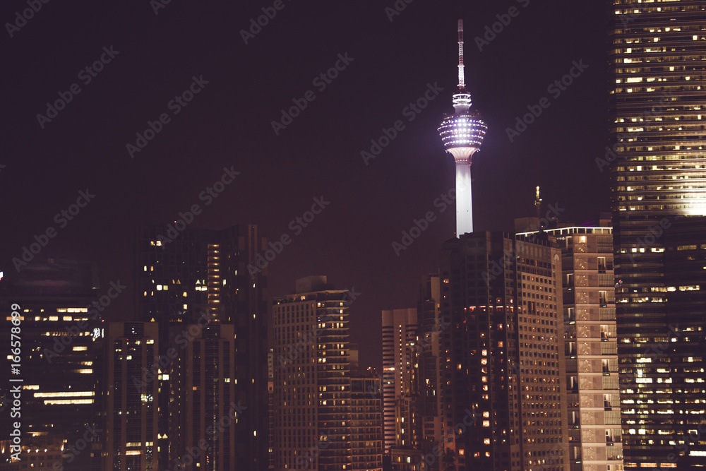 Spectacular night city view. Kuala Lumpur skyscrapers, Malaysia. Business metropolis. Modern buildings. Luxurious travel and tourism. Urban cityscape. Metropolitan architecture. Residental district