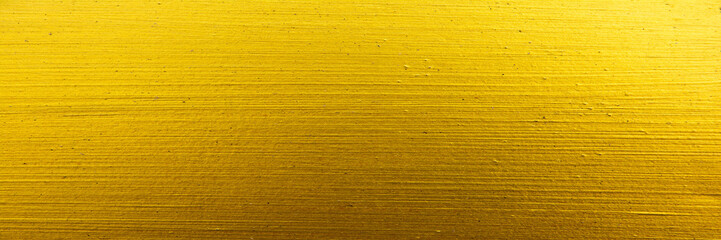 Metal texture background in gold.Panorama gold texture