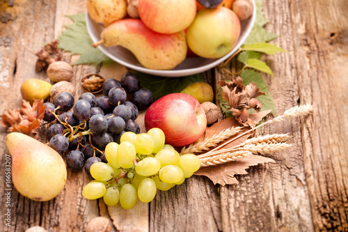 Healthy eating, healthy food - autumn organic fruit on rustic wooden table