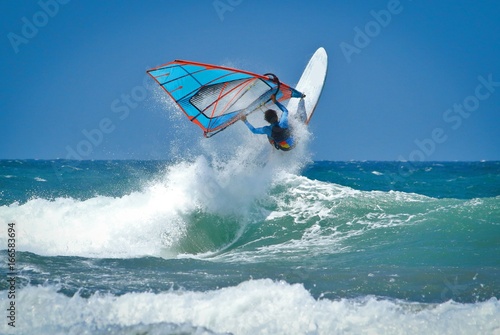 Windsurfing jumps out of the water