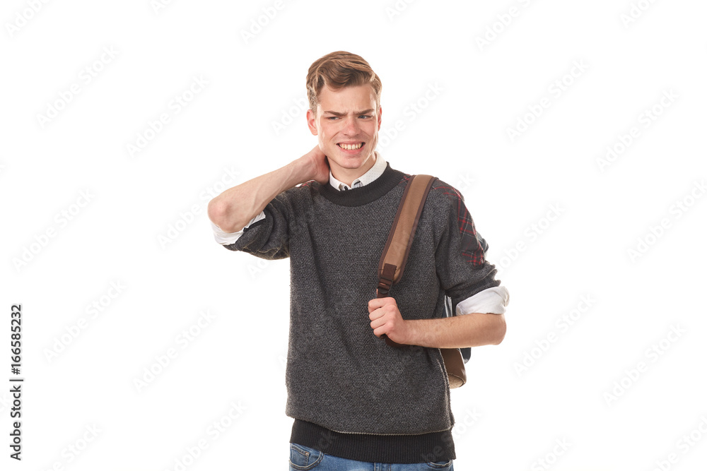 Studio portrait of handsome college boy in casual clothing with backpack Studio portrait of handsome college boy in casual clothing with backpack