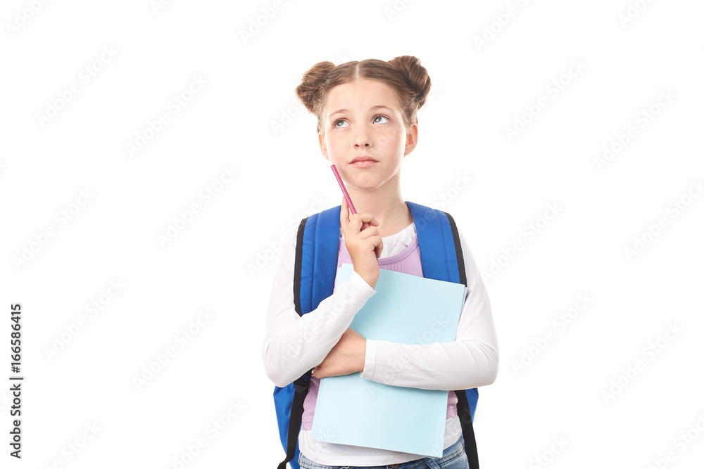 Elementary student with backpack posing against white background Elementary student with backpack posing against white background