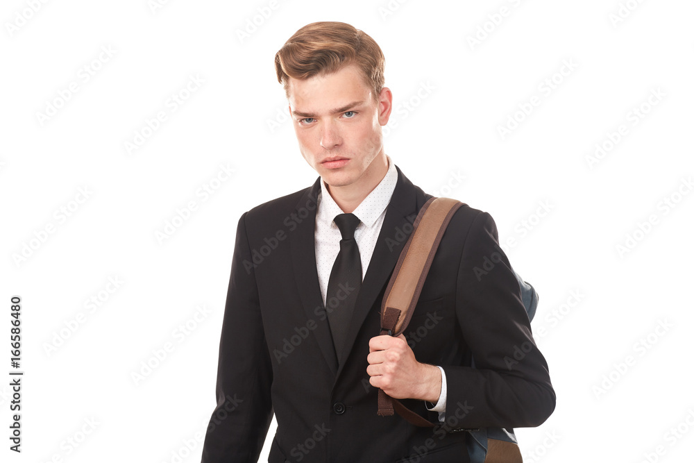 Studio portrait of teenage college student in black suit posing against white background Studio portrait of teenage college student in black suit posing against white background