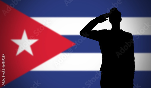 Photography Silhouette of a soldier saluting against the cuba flag