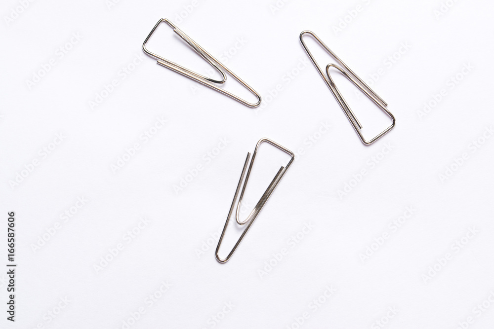 Several paper clips on white background Several paper clips on white background