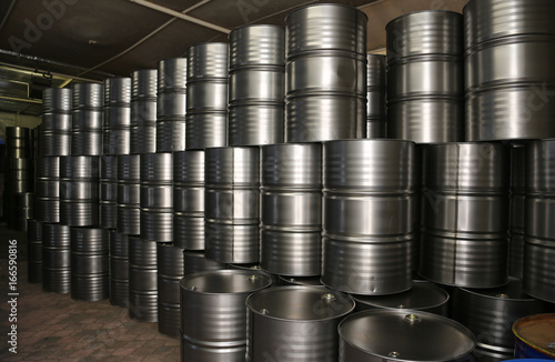 Big Oil drums,raw material and scrap in  factory 