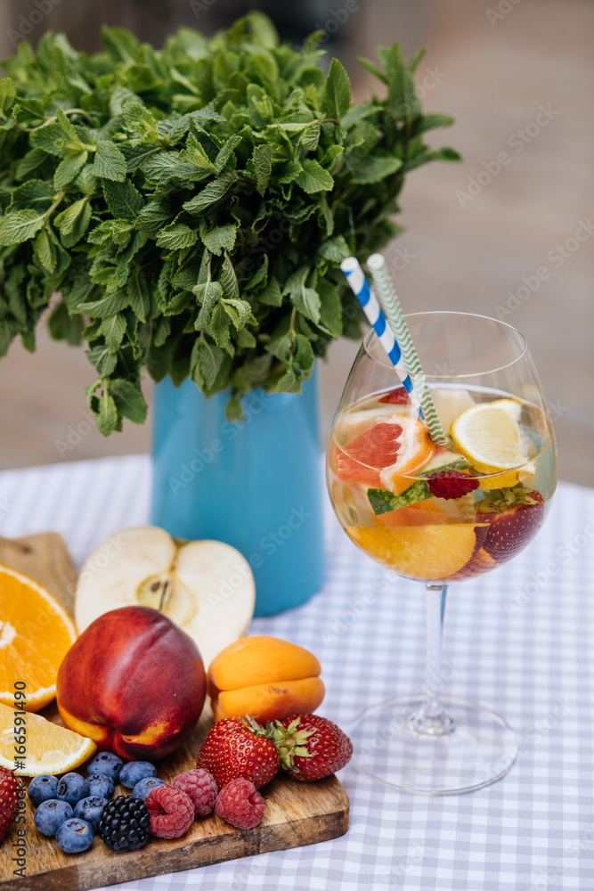 Delicious Red Sangria with fruits on table Delicious Red Sangria with fruits on table