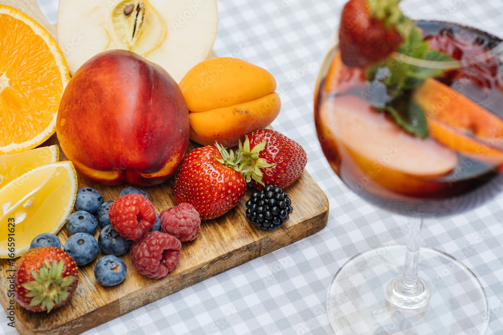 Delicious Red Sangria with fruits on table Delicious Red Sangria with fruits on table