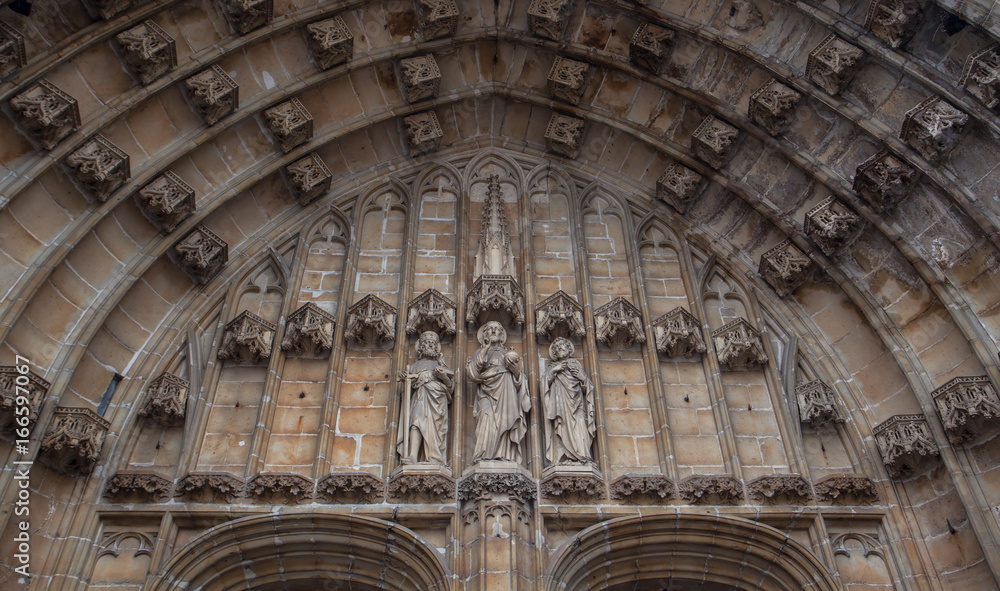 Obraz premium Medieval architecture style of door at St. Bavo's Cathedral in Ghent Belgium