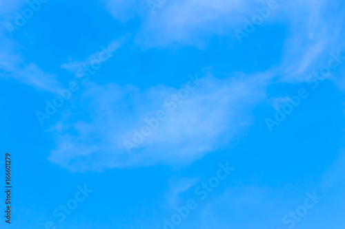Blue sky with clouds background lines intersect.