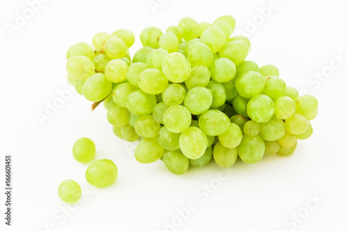 Bunch of green grapes on white background.