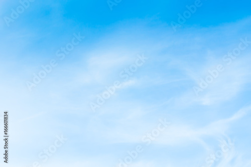 Blue sky with clouds background lines intersect.