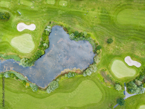 Aerial view of pond on golf course in Europe