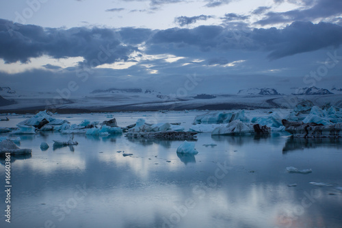 Iceland - Blue ice floes swimming in glacier lagoon joekulsarlon at vatnajoekull photo