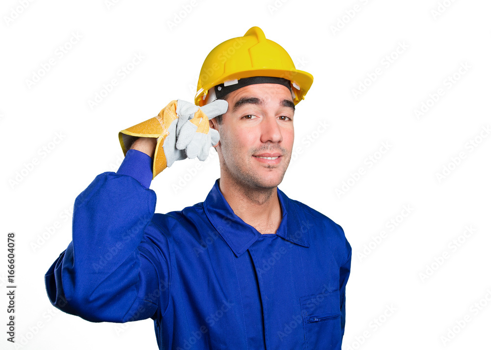 Young worker with a gesture of concentration on white background