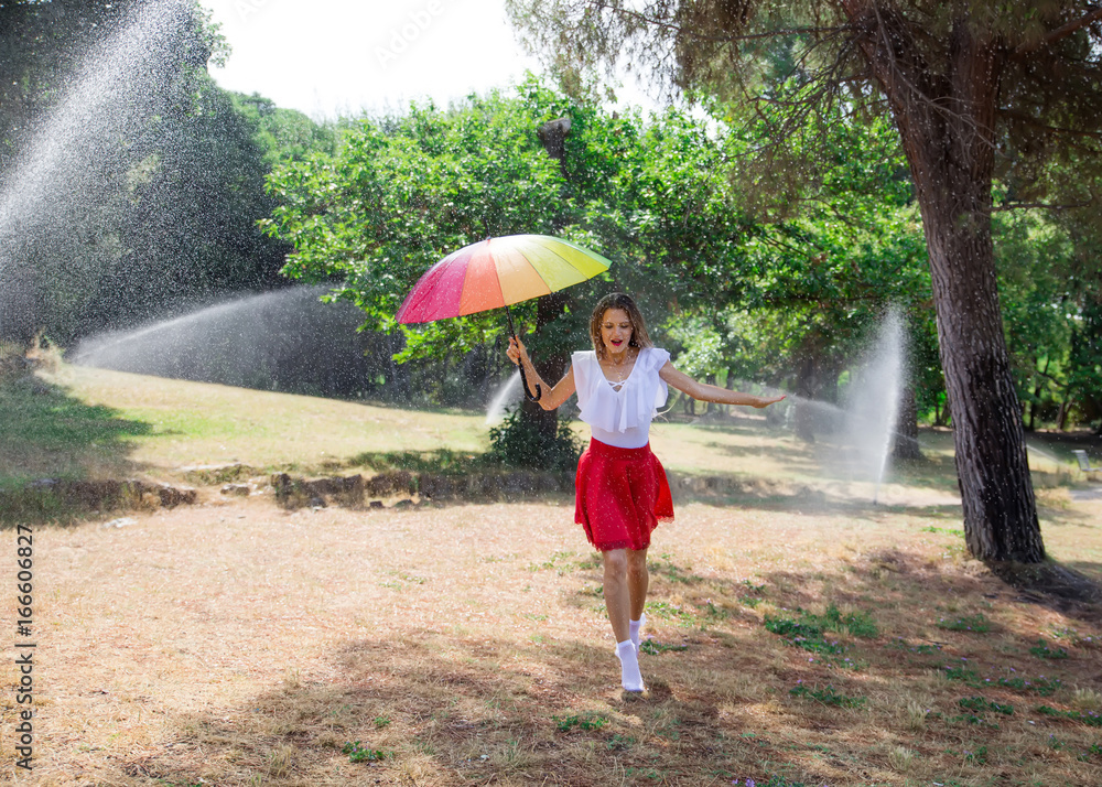 beautiful blond woman with umbrella run beautiful blond woman with umbrella run